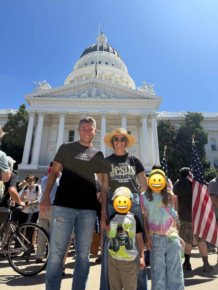 Chad and his wife in front of the California State Capitol